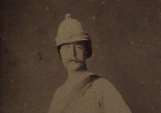 photo of a man in a pith helmet